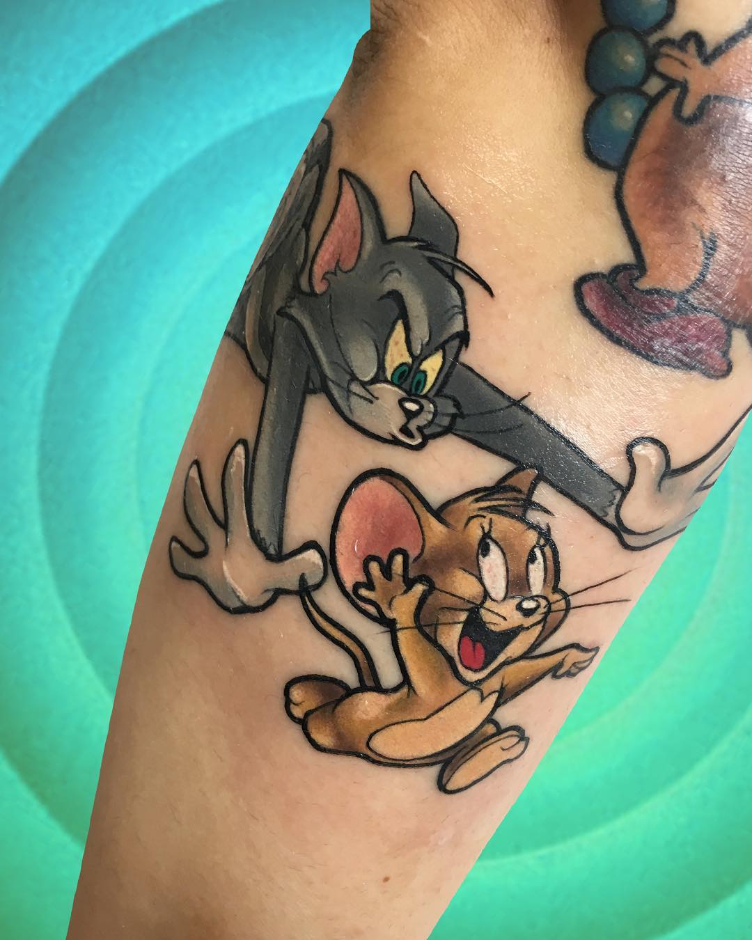 Tom and Jerry tattoo by @daniela.dag