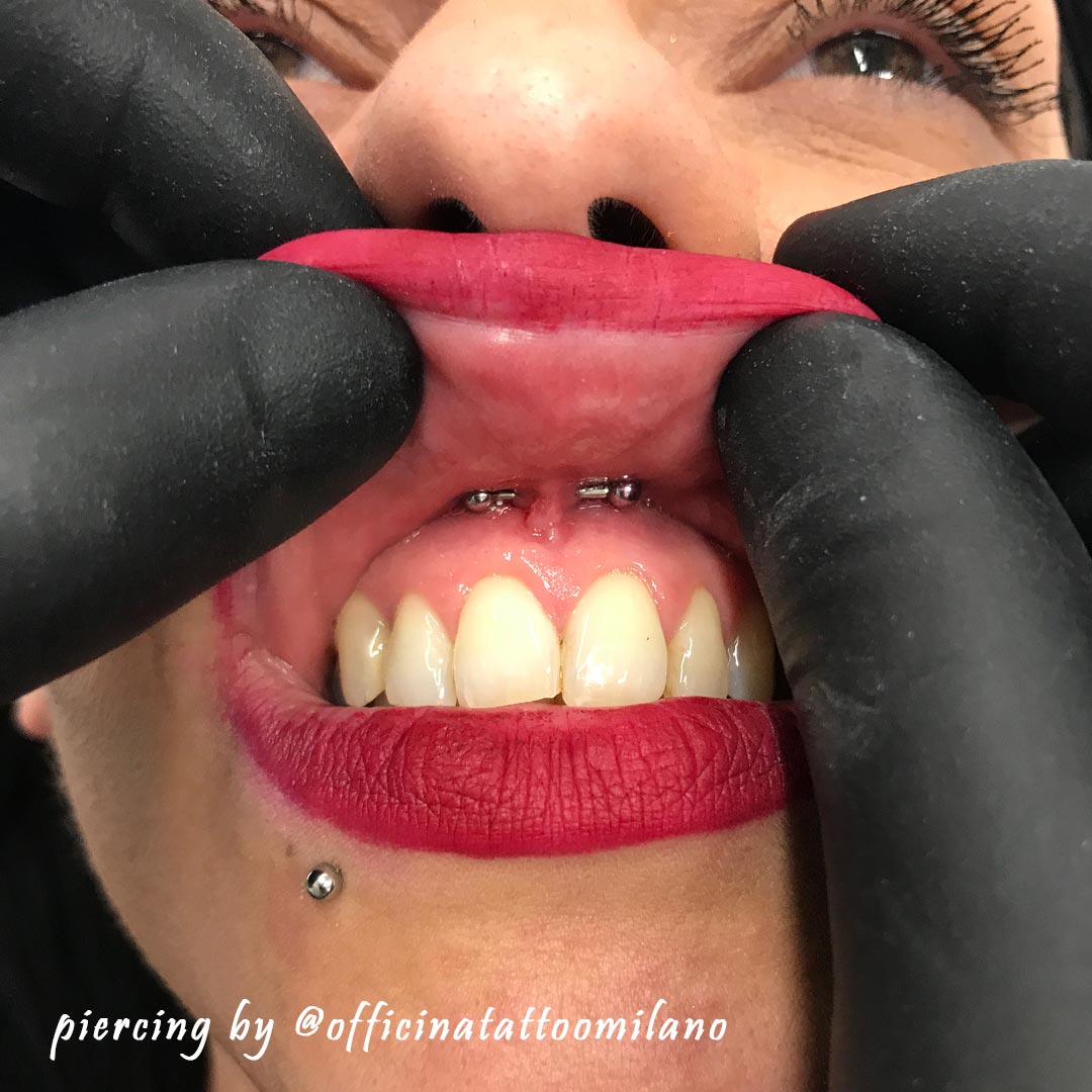 piercing smiley by @officinatattoomilano