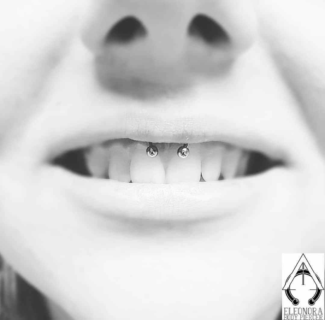 smiley piercing by @walktheline.tattoostudio