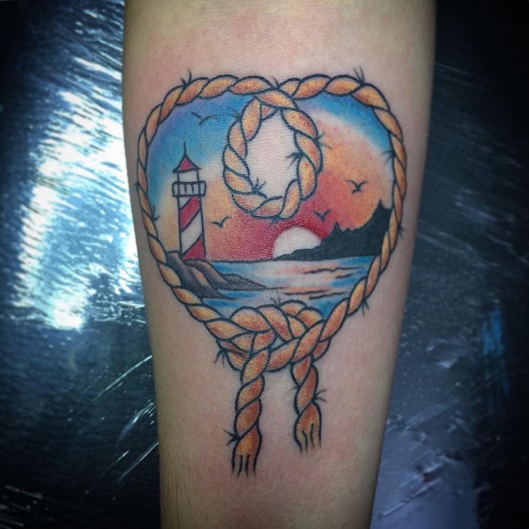 tatuaggio faro tramonto mare by @martyremo