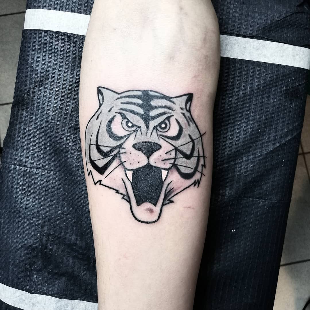 tatuaggio cartoni uomo tigre by @xmartinotattoox