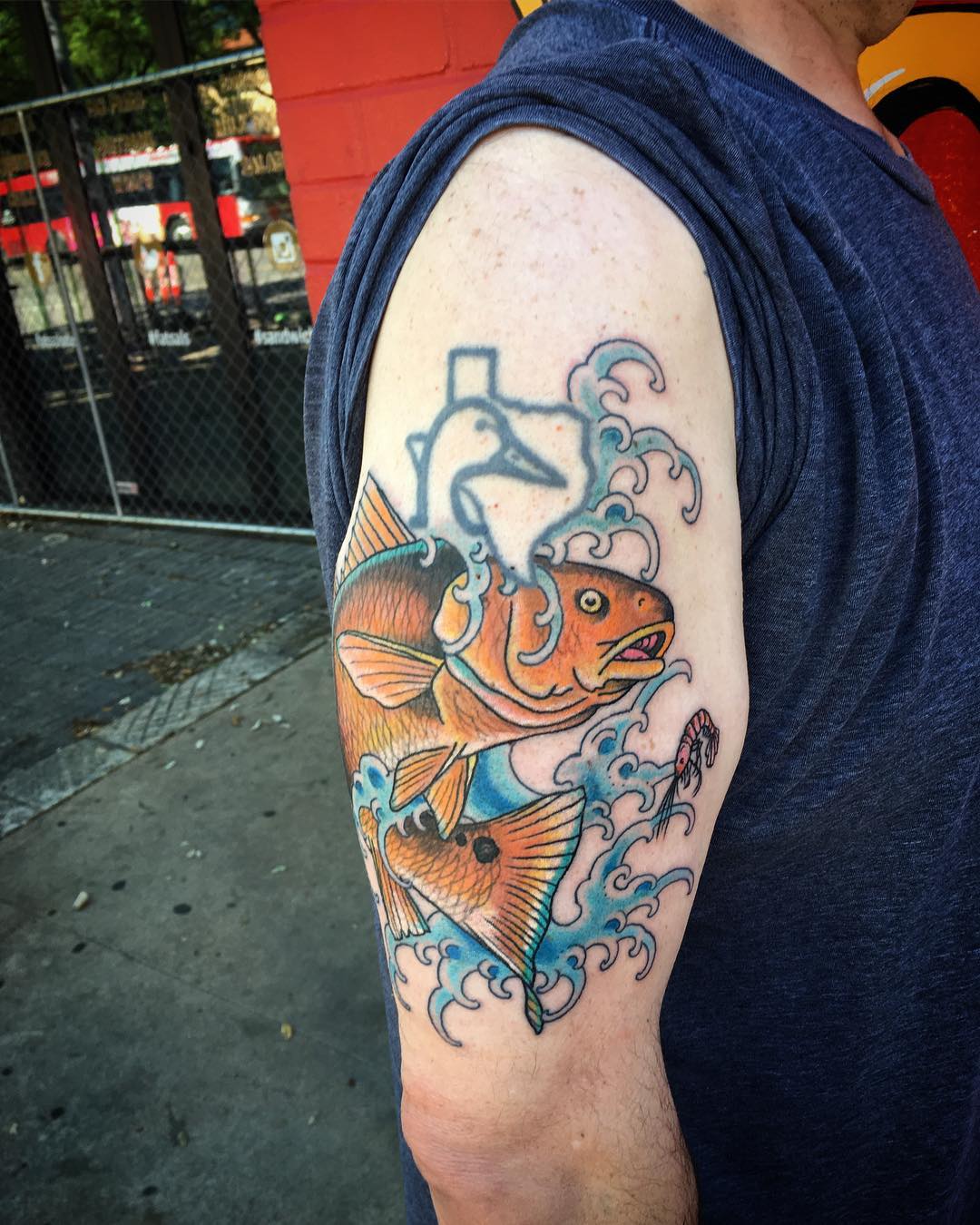 pesce rosso tattoo ph @codyblevinstattooart